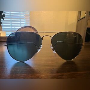 Ray Ban sunglasses with case. Great condition.